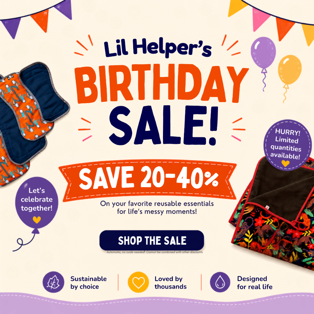 Promotional sale graphic for Lil Helper's Birthday Sale featuring reusable fabric accessories, including a patterned cloth pad and a waterproof mat, on a colorful cream background with balloons, confetti, and sale text.