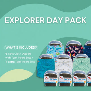 Explorer Day Pack with tank cloth diapers and inserts on a green background